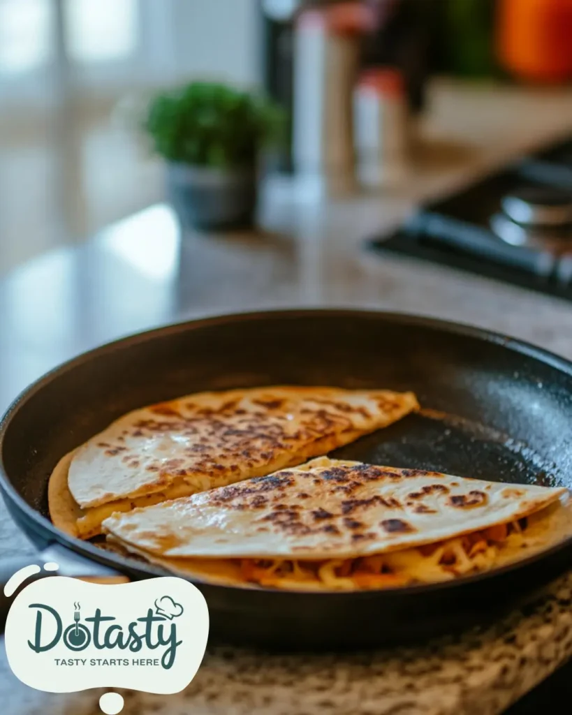 Cooking Reuben Quesadilla until golden brown in a nonstick skillet.